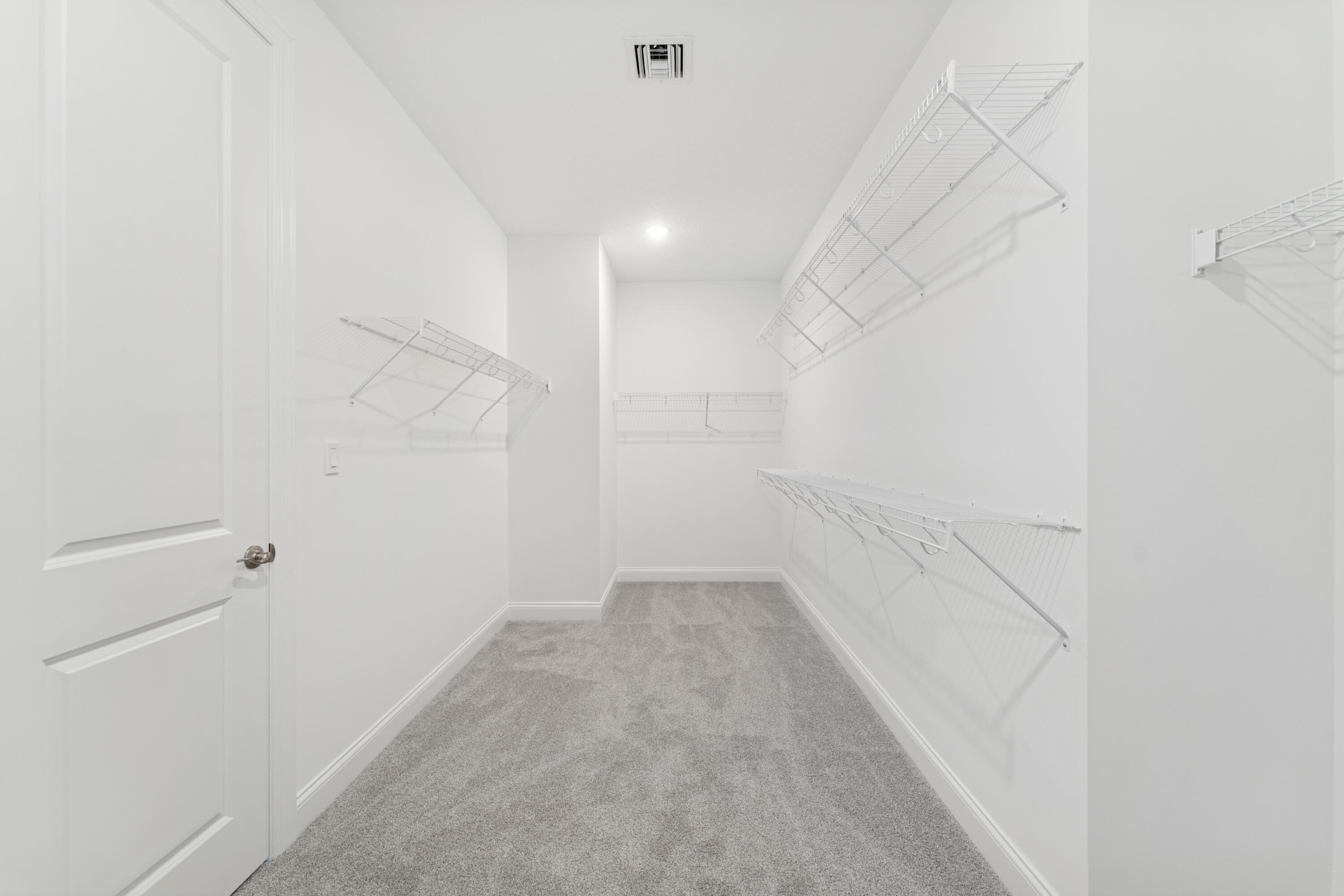 6790 Southeast Pine Drive, Unit 29 Stuart, FL 34997 - Photo 39 of 46 Primary Walk-in Closet