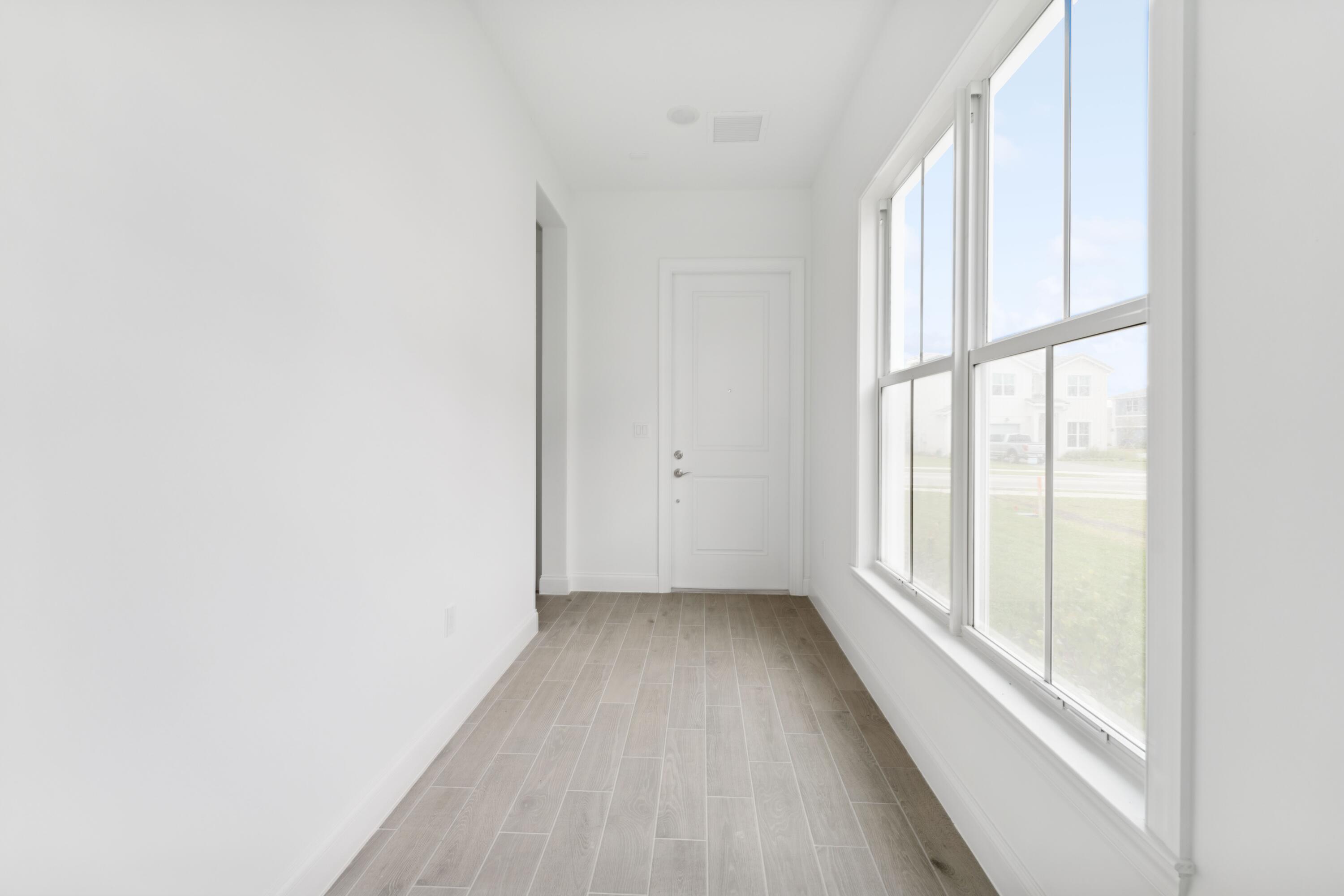 6790 Southeast Pine Drive, Unit 29 Stuart, FL 34997 - Photo 4 of 46 Foyer