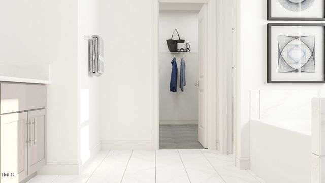 a bathroom with a shower and a sink