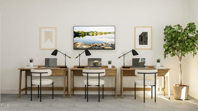 a view of a workspace with furniture