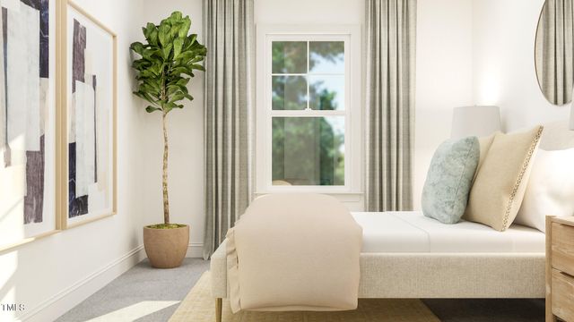 a bedroom with bed and a window