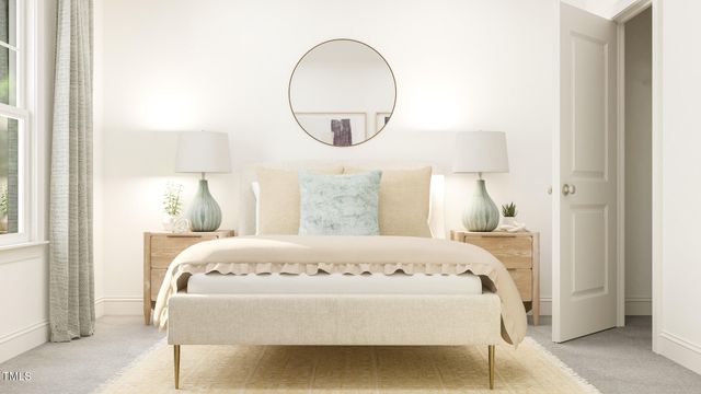 a bedroom with a bed and a mirror