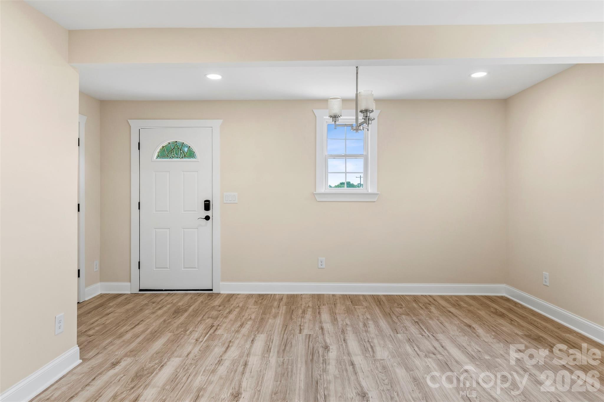 2480 Artz Road Salisbury, NC 28146 - Photo 23 of 33 wooden floor in an empty room with a window