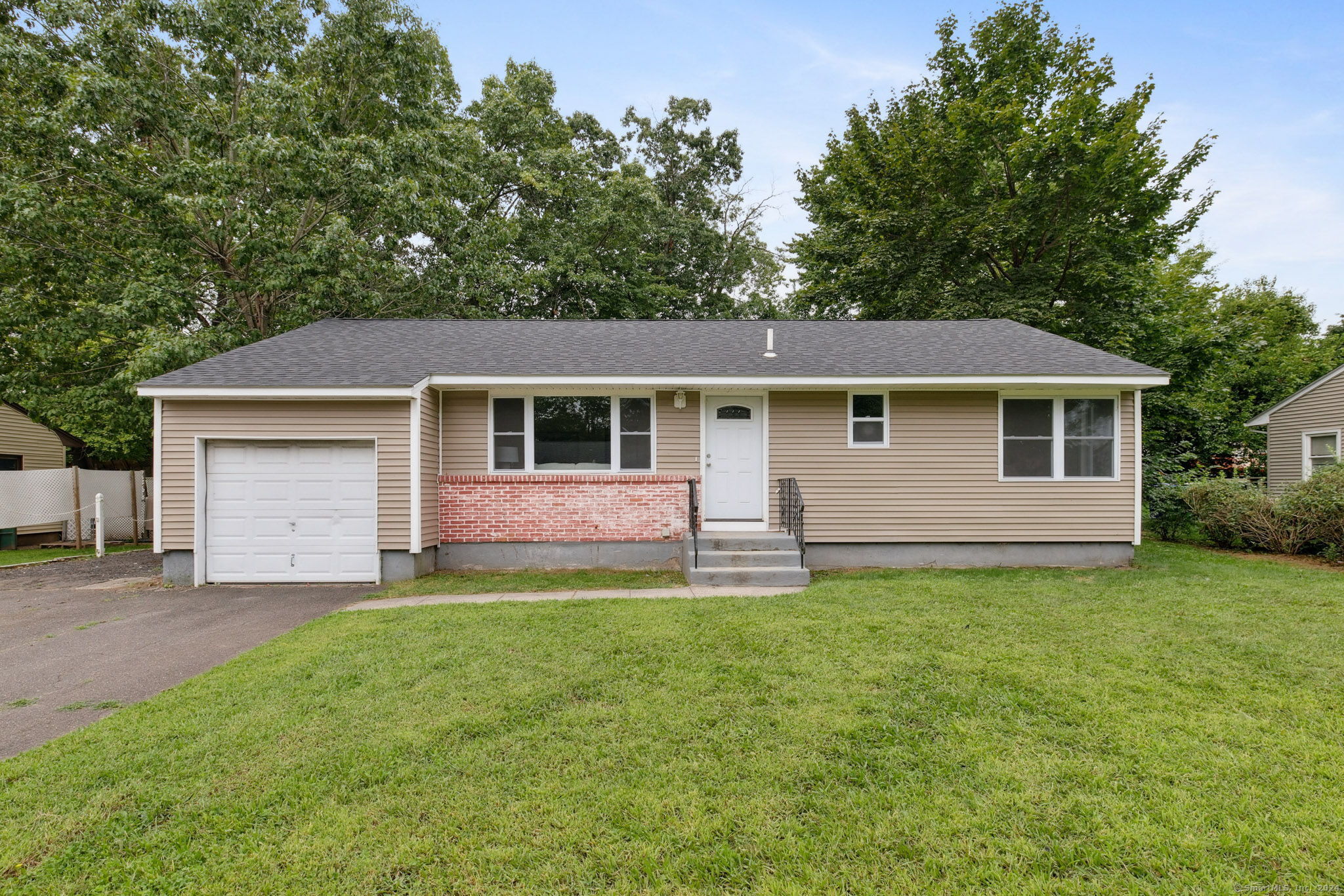 5 Patton Road Bloomfield, CT 06002 - Photo 1 of 1 front view of a house and a yard