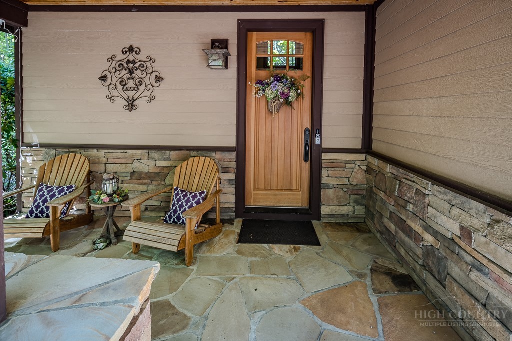 485 Woodlake Loop Road Elk Park, NC 28622 - Photo 3 of 44 a view of front door with furniture