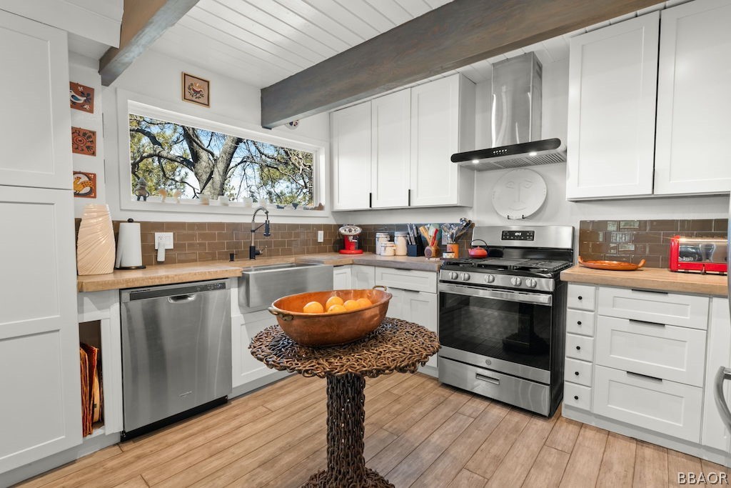 44408 Valley View Lane Sugarloaf, CA 92386 - Photo 12 of 31 a kitchen with stainless steel appliances granite countertop a sink a stove and cabinets