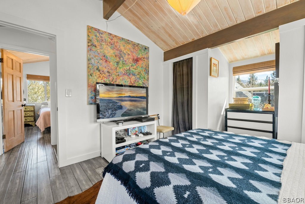 44408 Valley View Lane Sugarloaf, CA 92386 - Photo 17 of 31 a bedroom with a bed and a flat screen tv