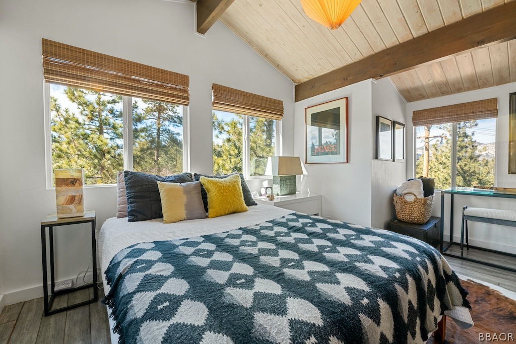 44408 Valley View Lane Sugarloaf, CA 92386 - Photo 18 of 31 a bedroom with a large bed and a balcony