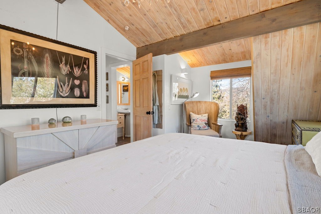 44408 Valley View Lane Sugarloaf, CA 92386 - Photo 22 of 31 a large bed sitting in a bedroom next to a cabinet
