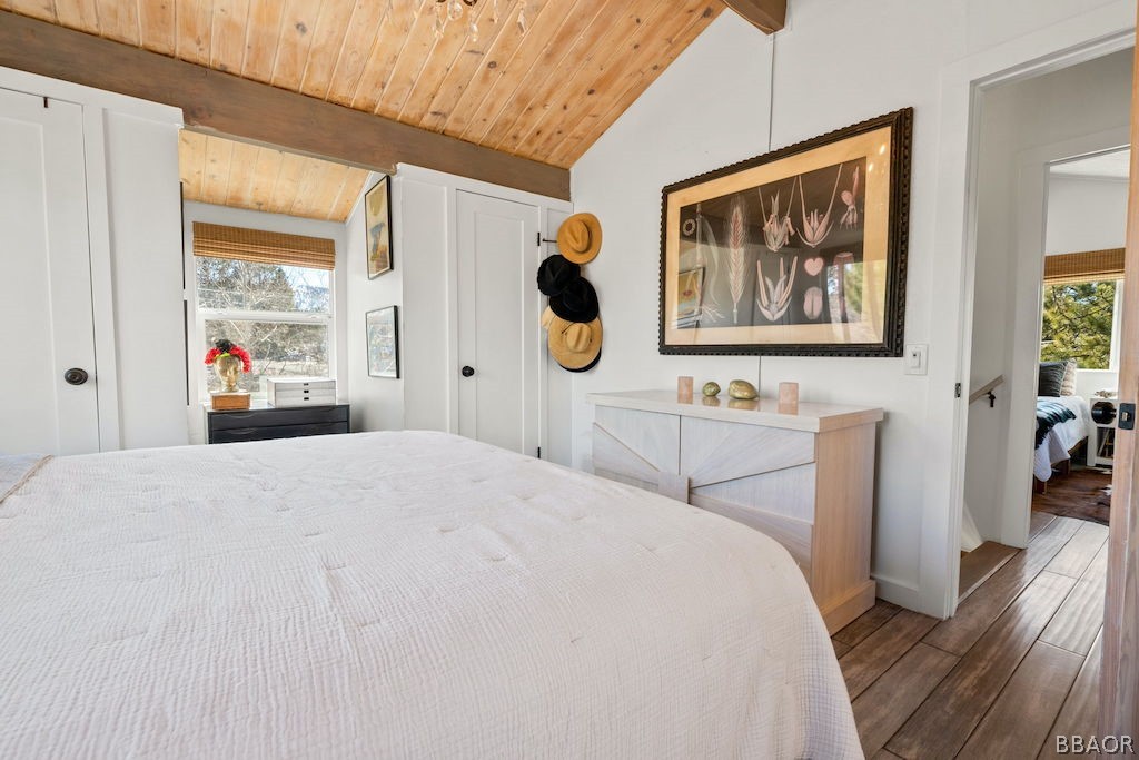 44408 Valley View Lane Sugarloaf, CA 92386 - Photo 24 of 31 a bedroom with a bed and wooden floor
