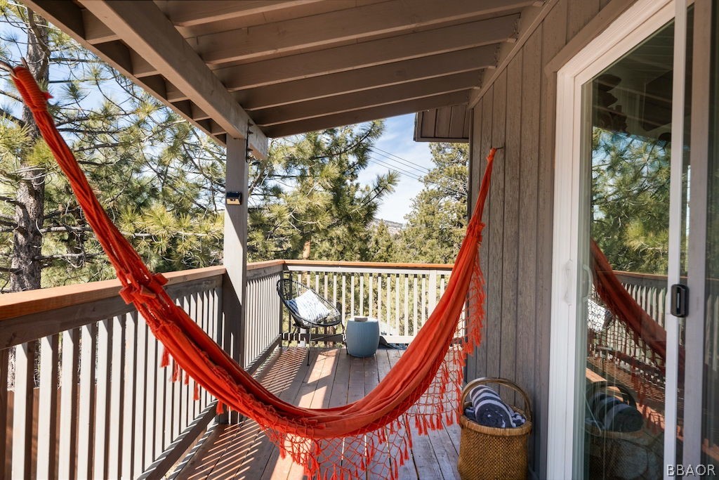 44408 Valley View Lane Sugarloaf, CA 92386 - Photo 25 of 31 a view of a porch with wooden floor