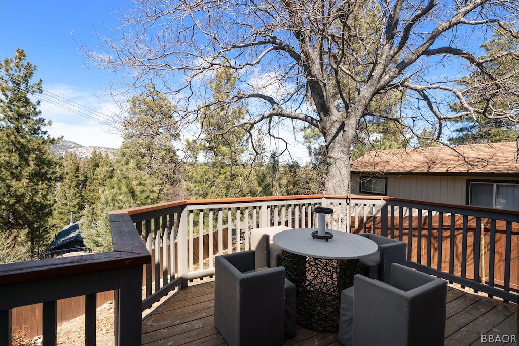 44408 Valley View Lane Sugarloaf, CA 92386 - Photo 27 of 31 a view of a chair and table on the deck