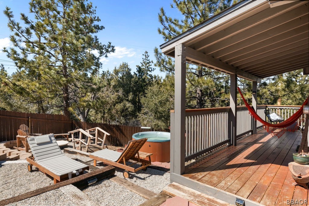 44408 Valley View Lane Sugarloaf, CA 92386 - Photo 29 of 31 a view of a patio with a table chairs and a barbeque