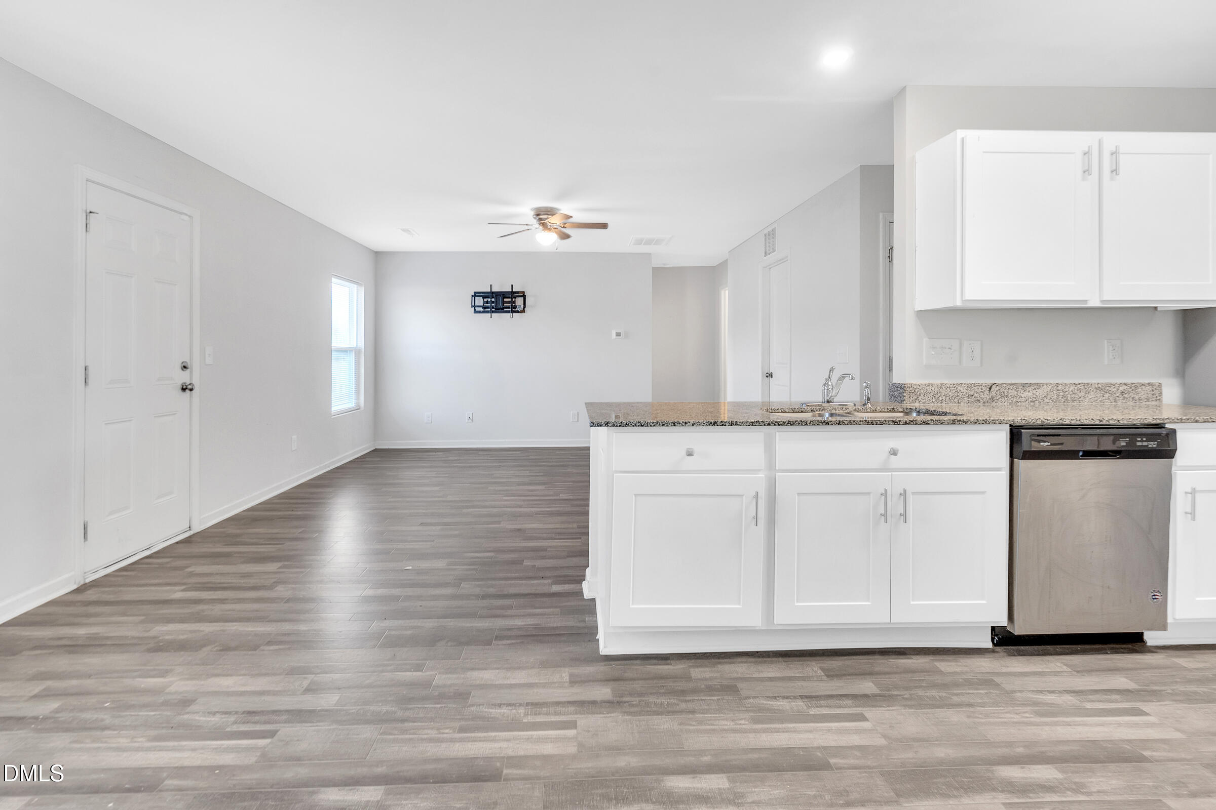 3146 Stoney Hill Church Road Bailey, NC 27807 - Photo 6 of 26 a view of cabinets a wooden floor and a sink