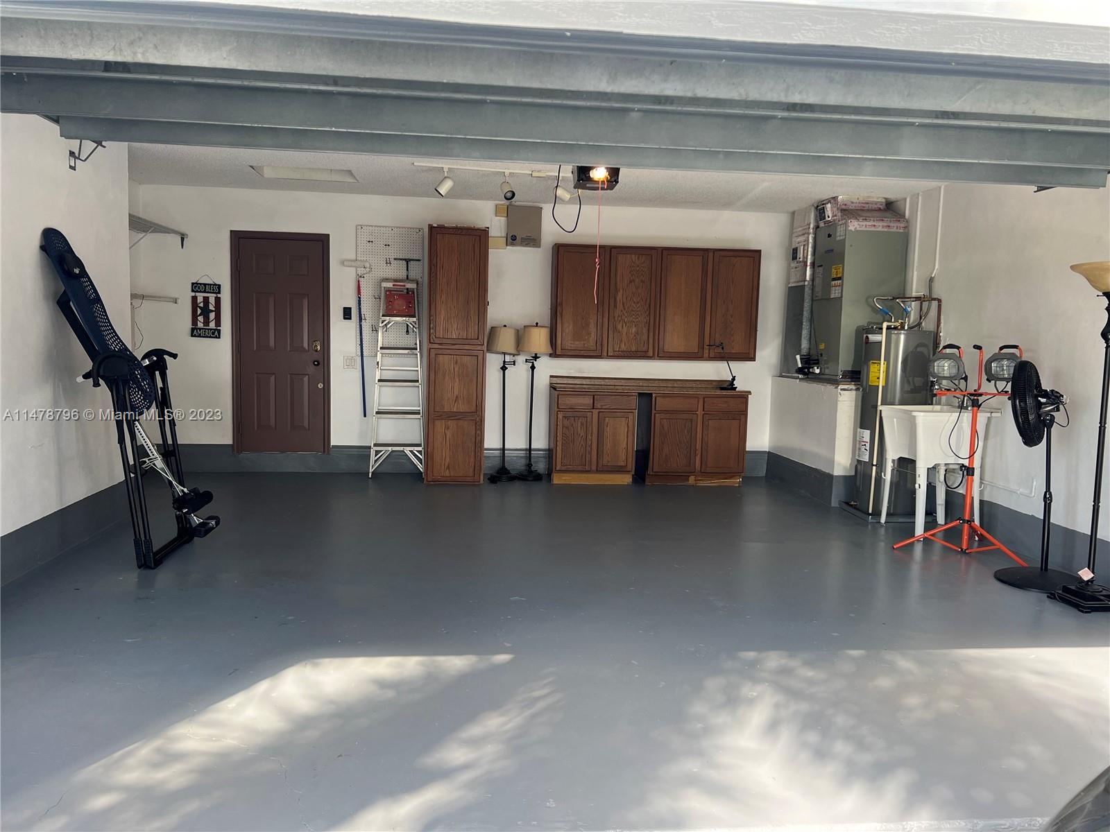 1135 Areca Way Weston, FL 33327 - Photo 27 of 45 a view of a room with gym equipment