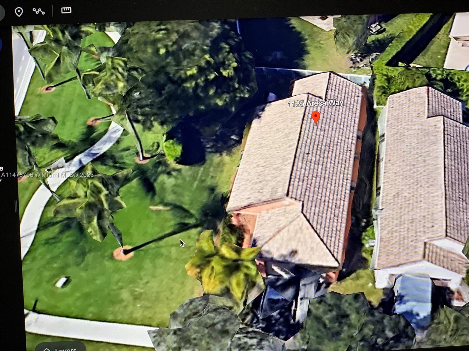 1135 Areca Way Weston, FL 33327 - Photo 30 of 45 a view of a garden with plants