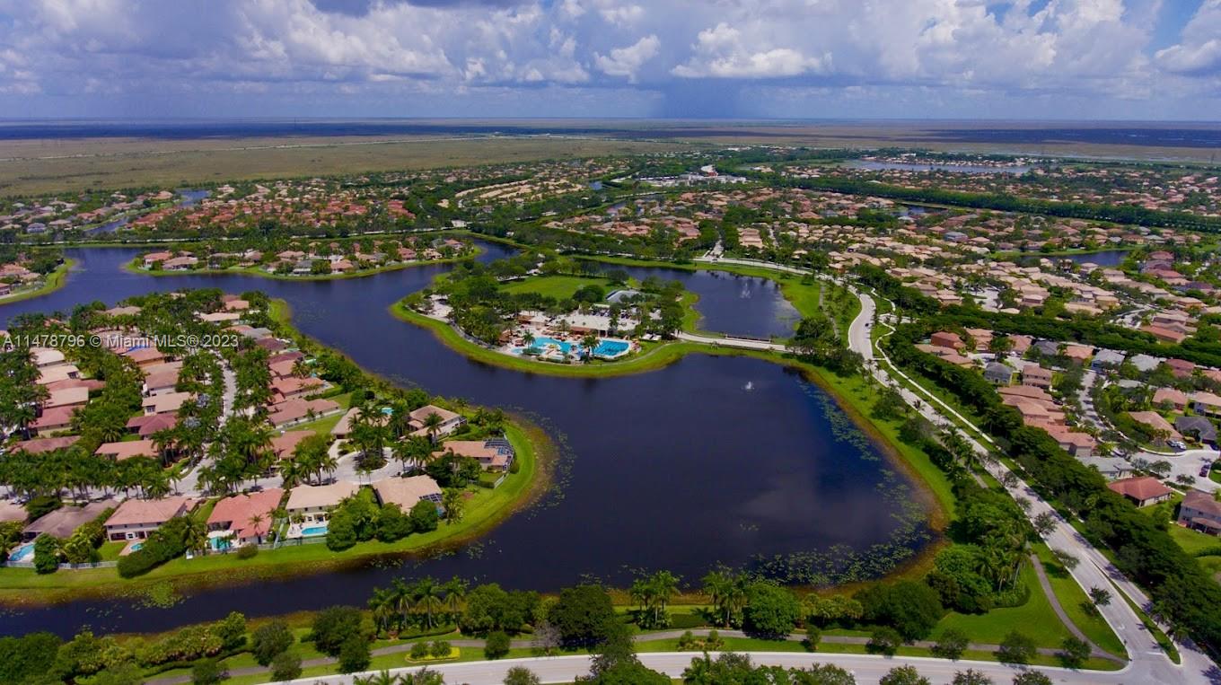 1135 Areca Way Weston, FL 33327 - Photo 31 of 45 a view of a city with an ocean view