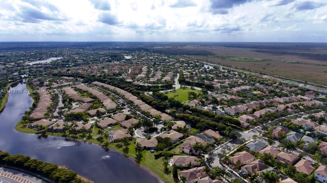 1135 Areca Way Weston, FL 33327 - Photo 32 of 45 an aerial view of a city