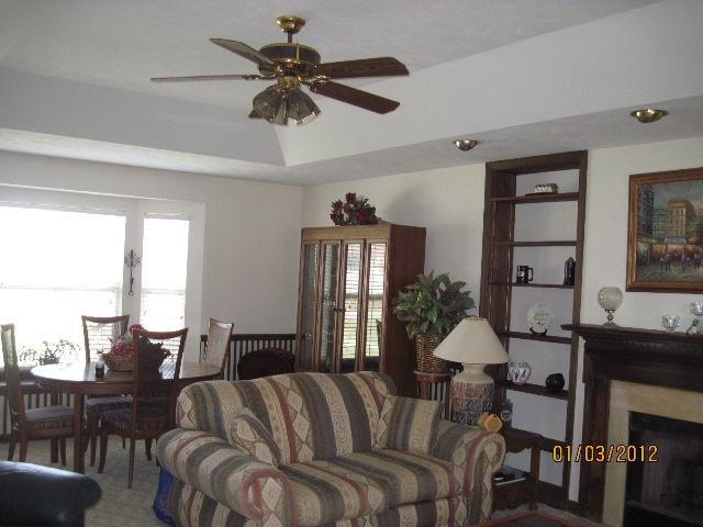 1008 Turnbull Road White Bluff, TN 37187 - Photo 11 of 18 Den is so large, current owner uses front bay window with window seat as backdrop to full dining setting