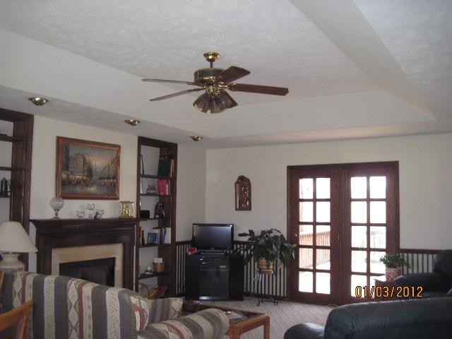 1008 Turnbull Road White Bluff, TN 37187 - Photo 9 of 18 Large den with fireplace, built in shelves on each side of fireplace, trey ceilings and lots of space to move around