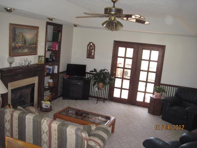 1008 Turnbull Road White Bluff, TN 37187 - Photo 10 of 18 Another view of great den with wood french doors leading to wonderful deck and back yard space