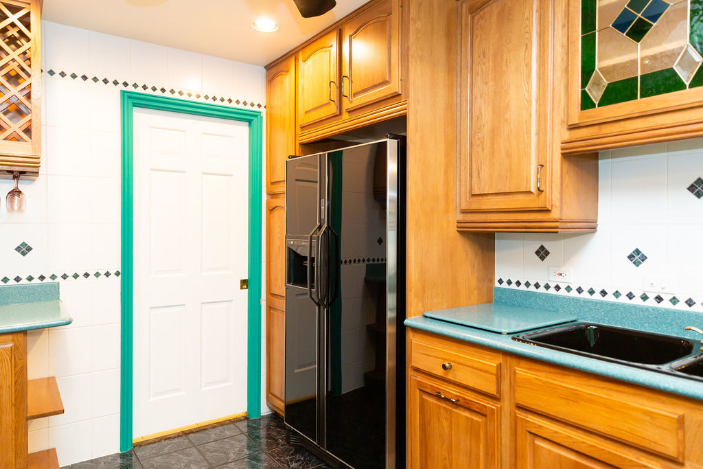 3427 Vollmer Road, Unit 209 Flossmoor, IL 60422 - Photo 16 of 45 a kitchen with stainless steel appliances granite countertop a refrigerator and a sink