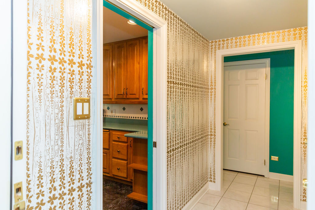 3427 Vollmer Road, Unit 209 Flossmoor, IL 60422 - Photo 18 of 45 a view of a hallway with a door and wooden floor