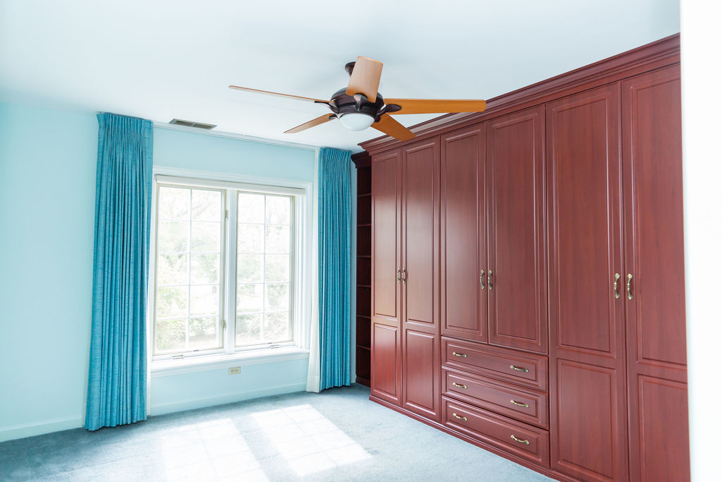 3427 Vollmer Road, Unit 209 Flossmoor, IL 60422 - Photo 21 of 45 a view of a livingroom with a ceiling fan and window