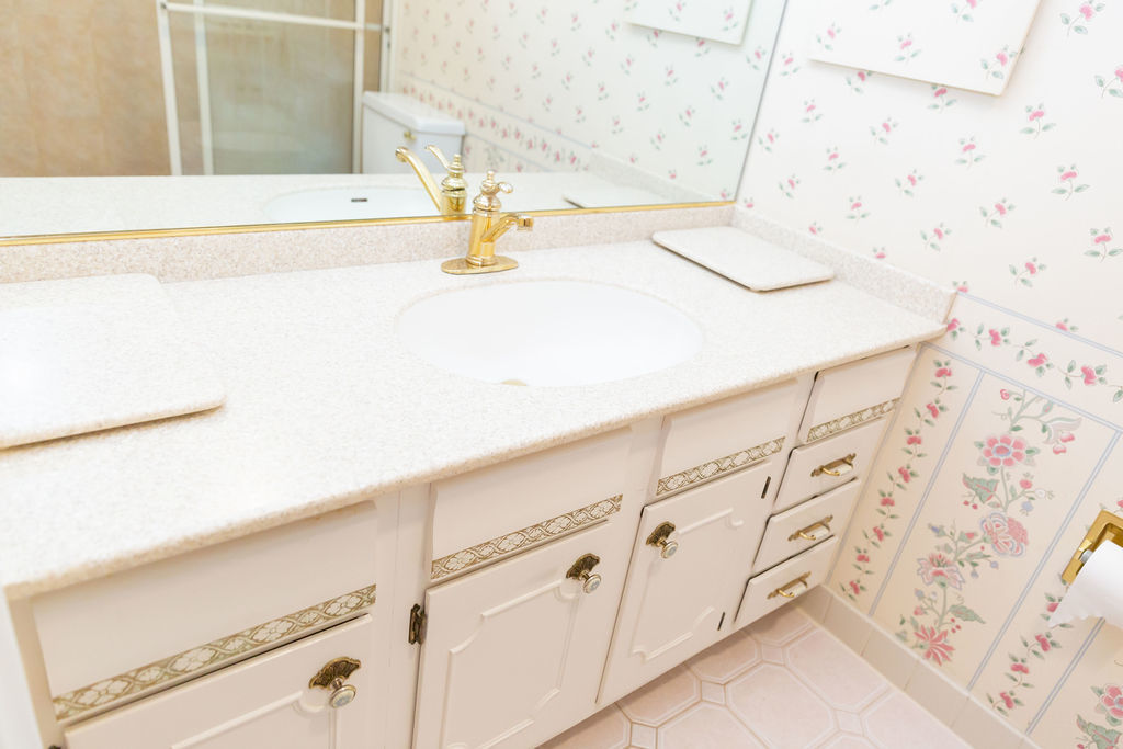 3427 Vollmer Road, Unit 209 Flossmoor, IL 60422 - Photo 25 of 45 a close up of a sink and a mirror