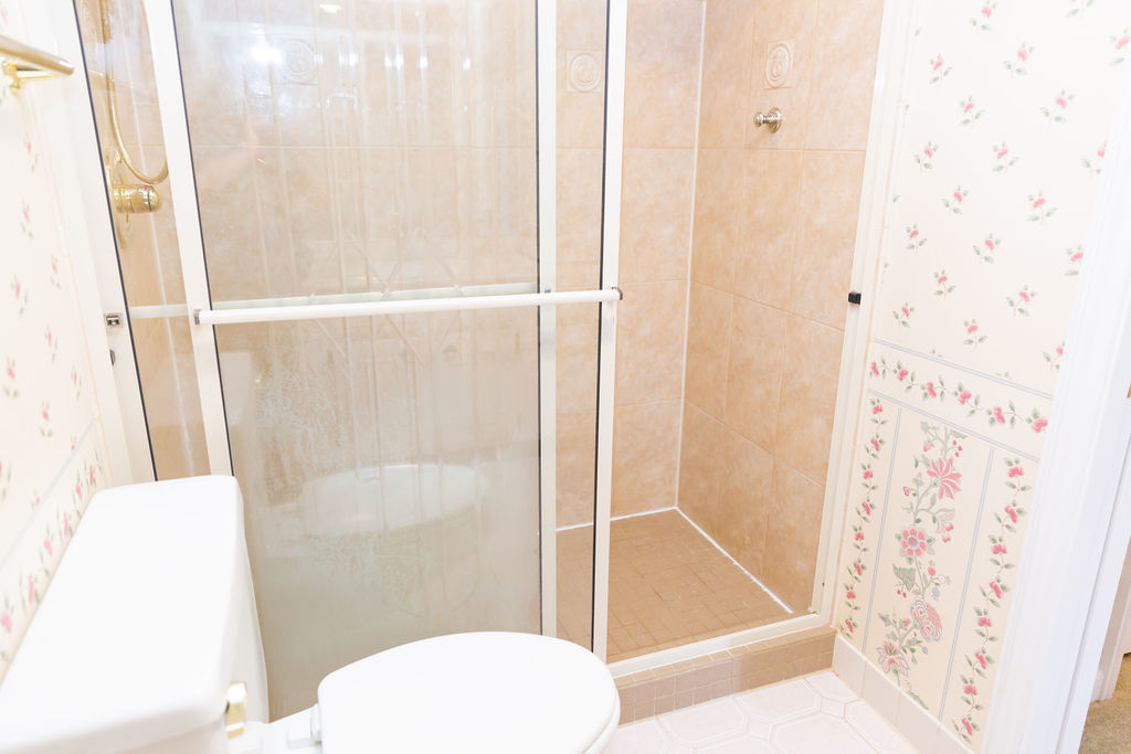 3427 Vollmer Road, Unit 209 Flossmoor, IL 60422 - Photo 28 of 45 a bathroom with a shower and toilet