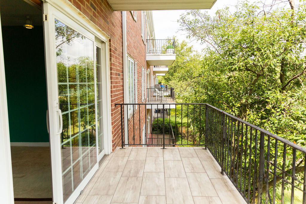 3427 Vollmer Road, Unit 209 Flossmoor, IL 60422 - Photo 41 of 45 a view of a balcony with wooden floor