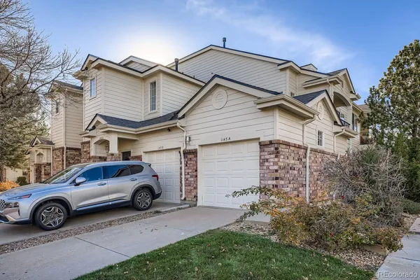 a car parked in front of a house