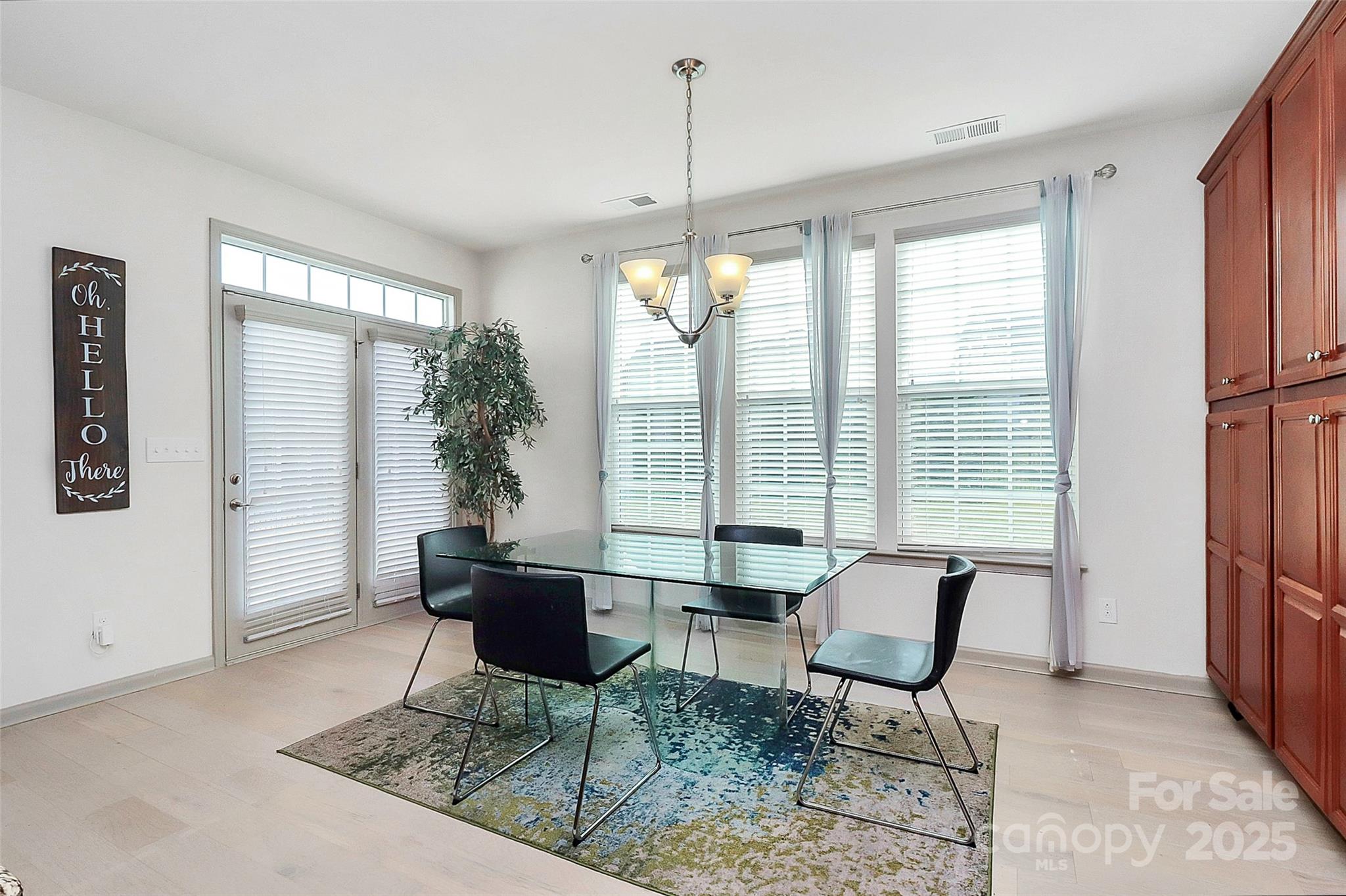 7362 Millstone Circle Southwest Concord, NC 28025 - Photo 13 of 45 a living room with furniture and a large window