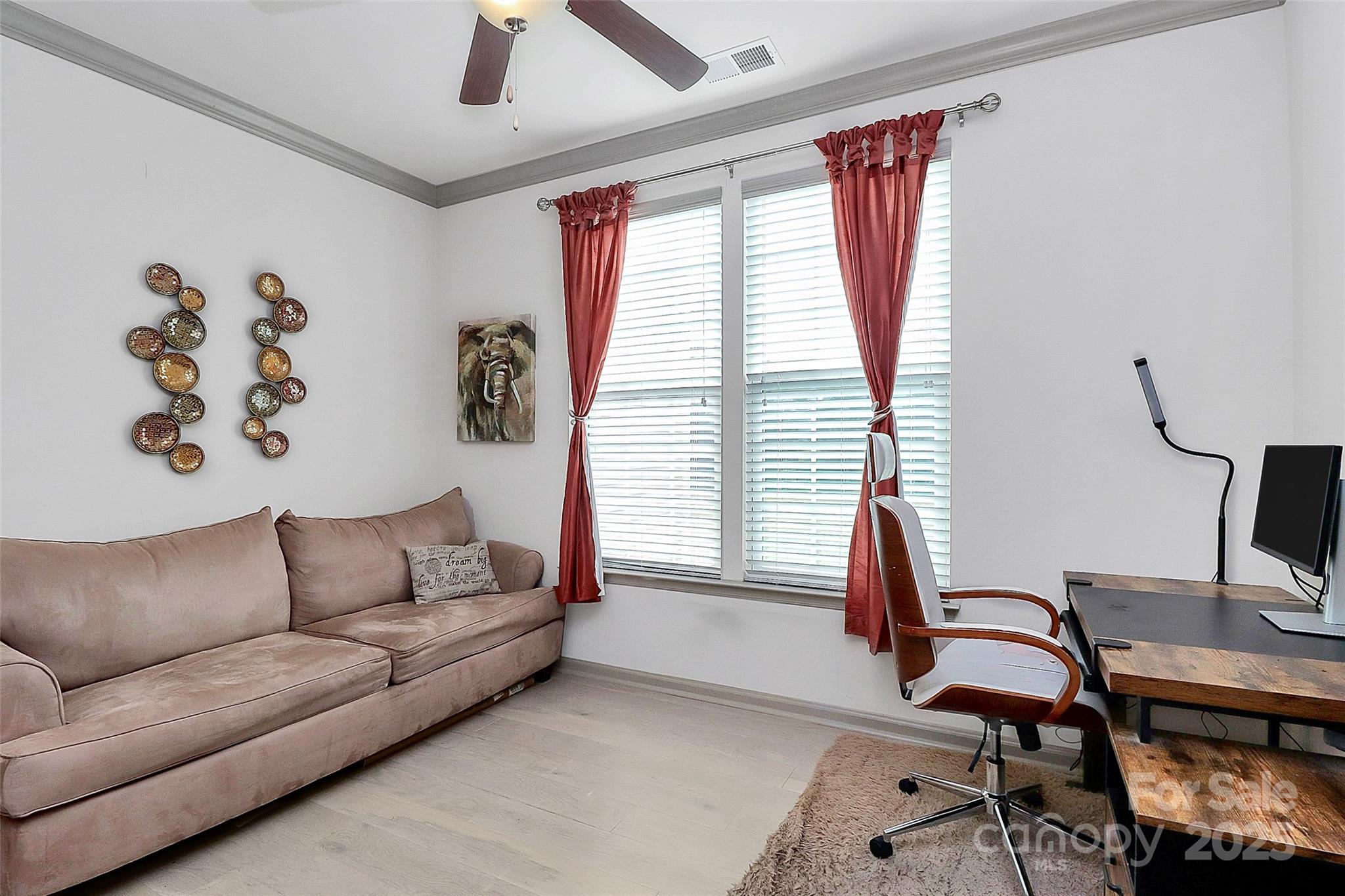 7362 Millstone Circle Southwest Concord, NC 28025 - Photo 19 of 45 a view of a livingroom with workspace and a couch