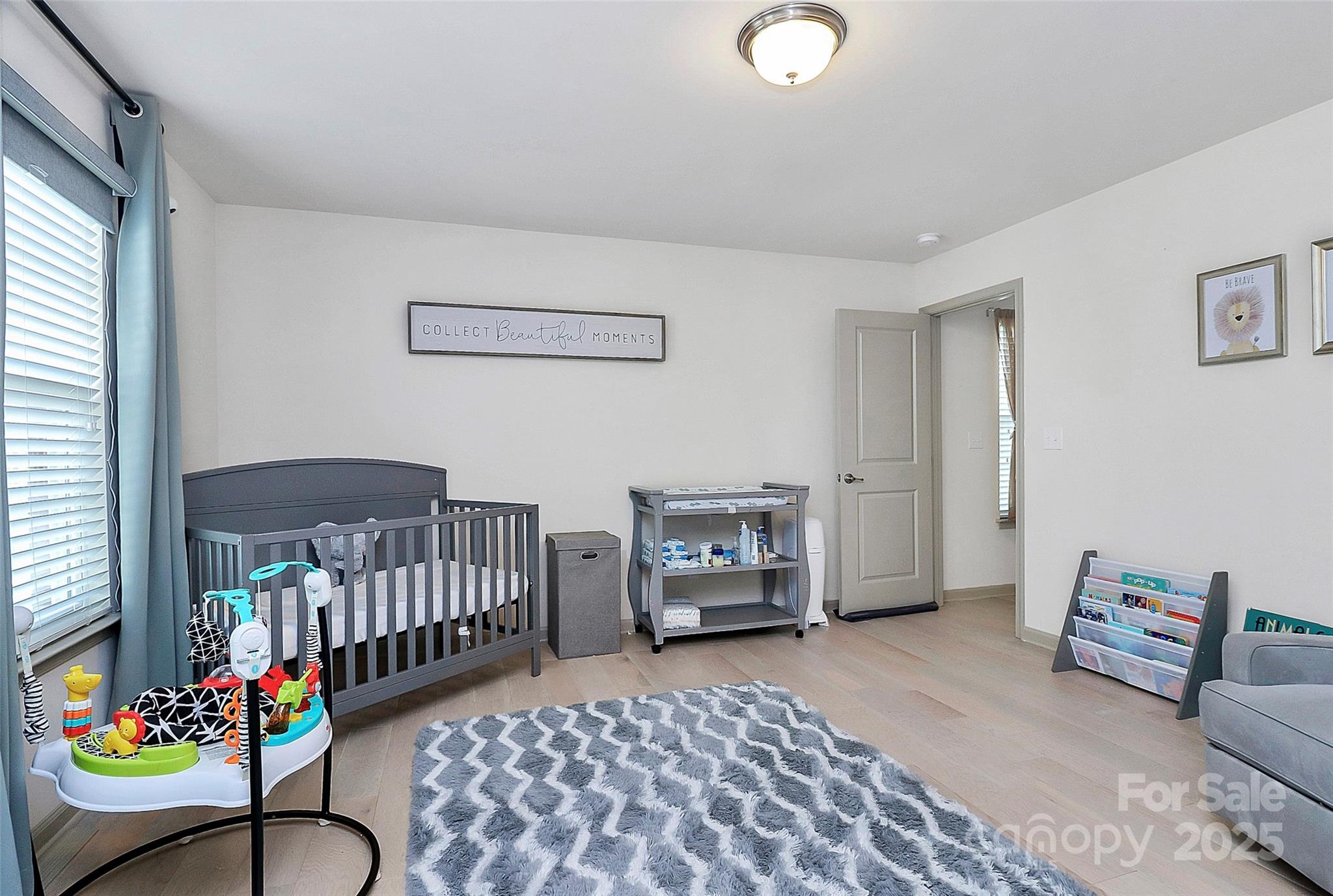 7362 Millstone Circle Southwest Concord, NC 28025 - Photo 21 of 45 a bedroom with furniture and a baby crib