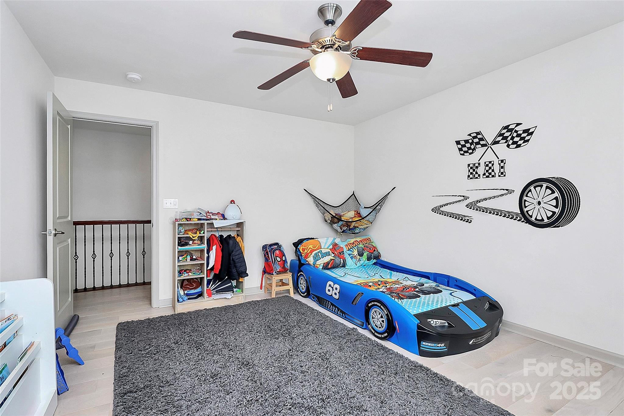 7362 Millstone Circle Southwest Concord, NC 28025 - Photo 25 of 45 a view of play room with furniture and a chandelier