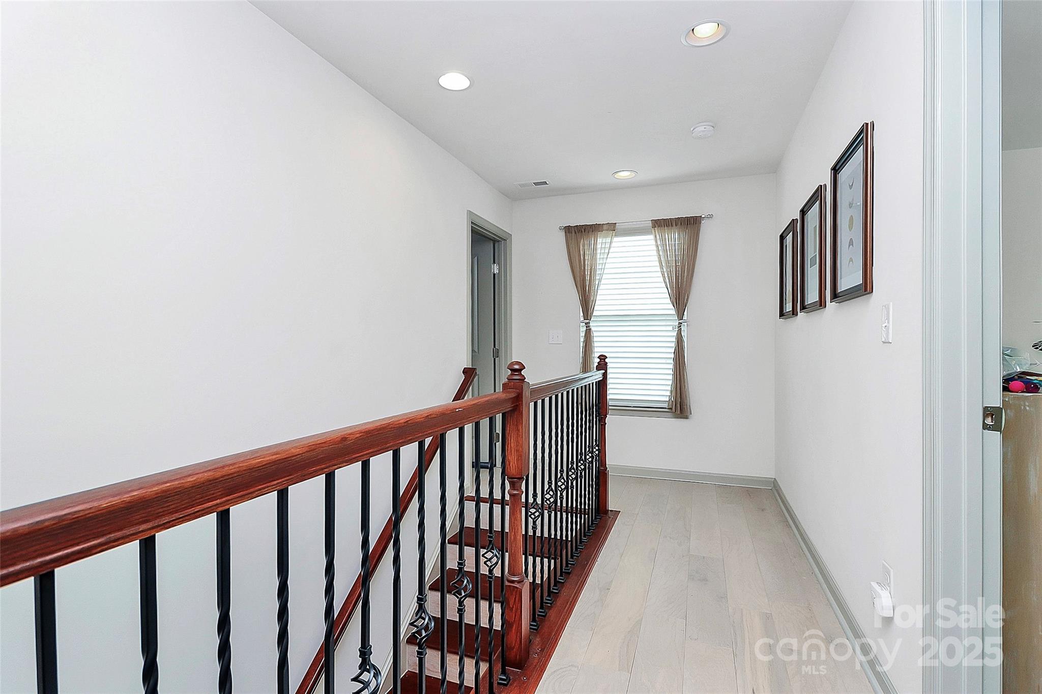 7362 Millstone Circle Southwest Concord, NC 28025 - Photo 26 of 45 a view of hallway with stairs