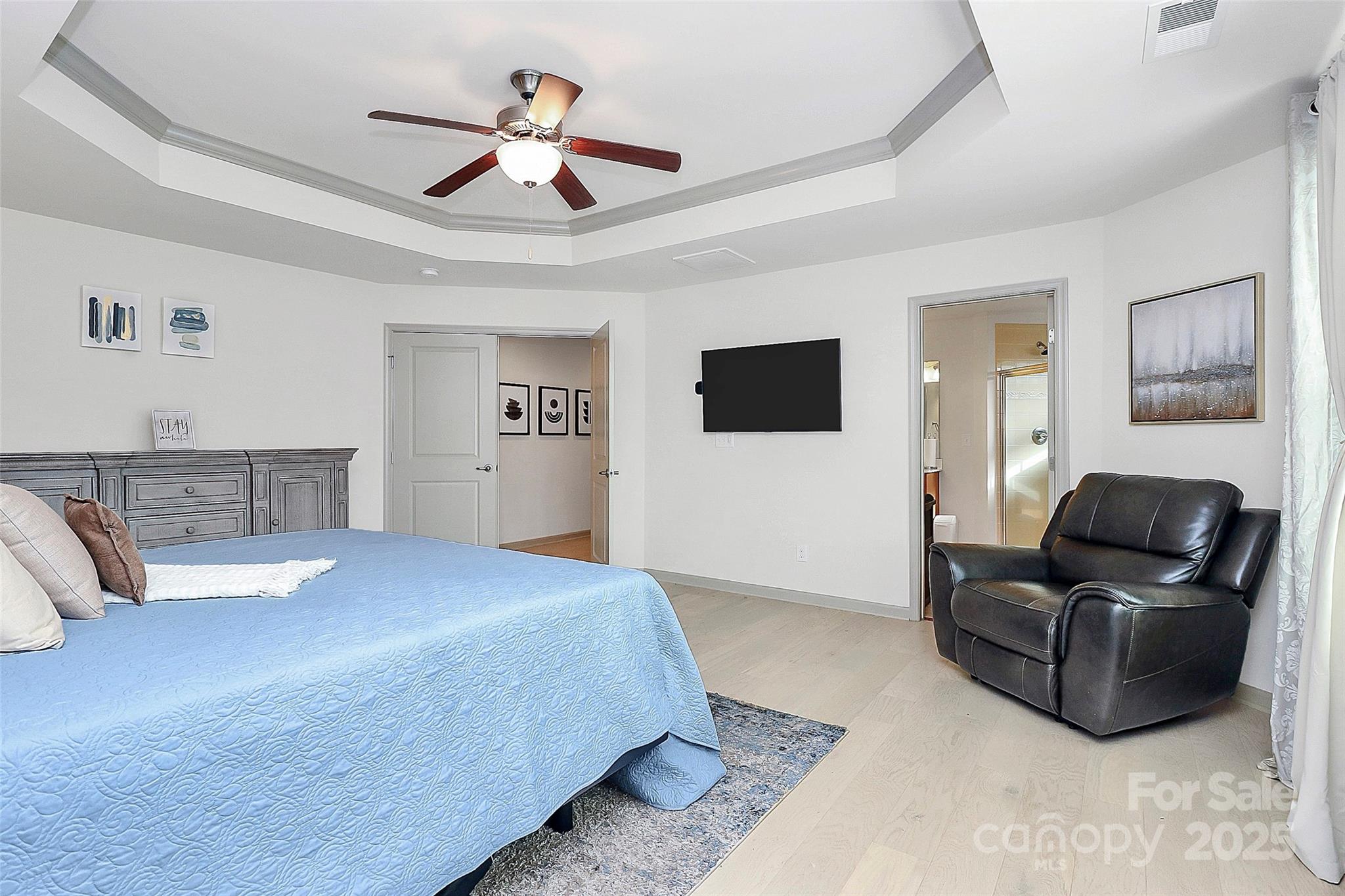 7362 Millstone Circle Southwest Concord, NC 28025 - Photo 31 of 45 a living room with furniture and a flat screen tv