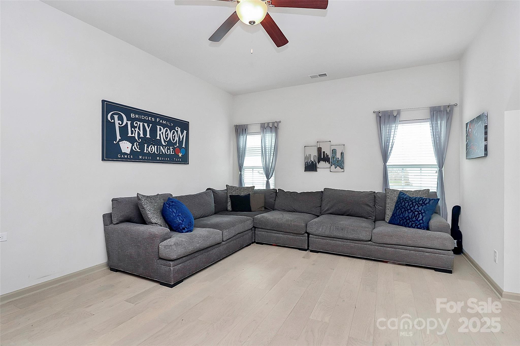 7362 Millstone Circle Southwest Concord, NC 28025 - Photo 36 of 45 a living room with furniture and a couch