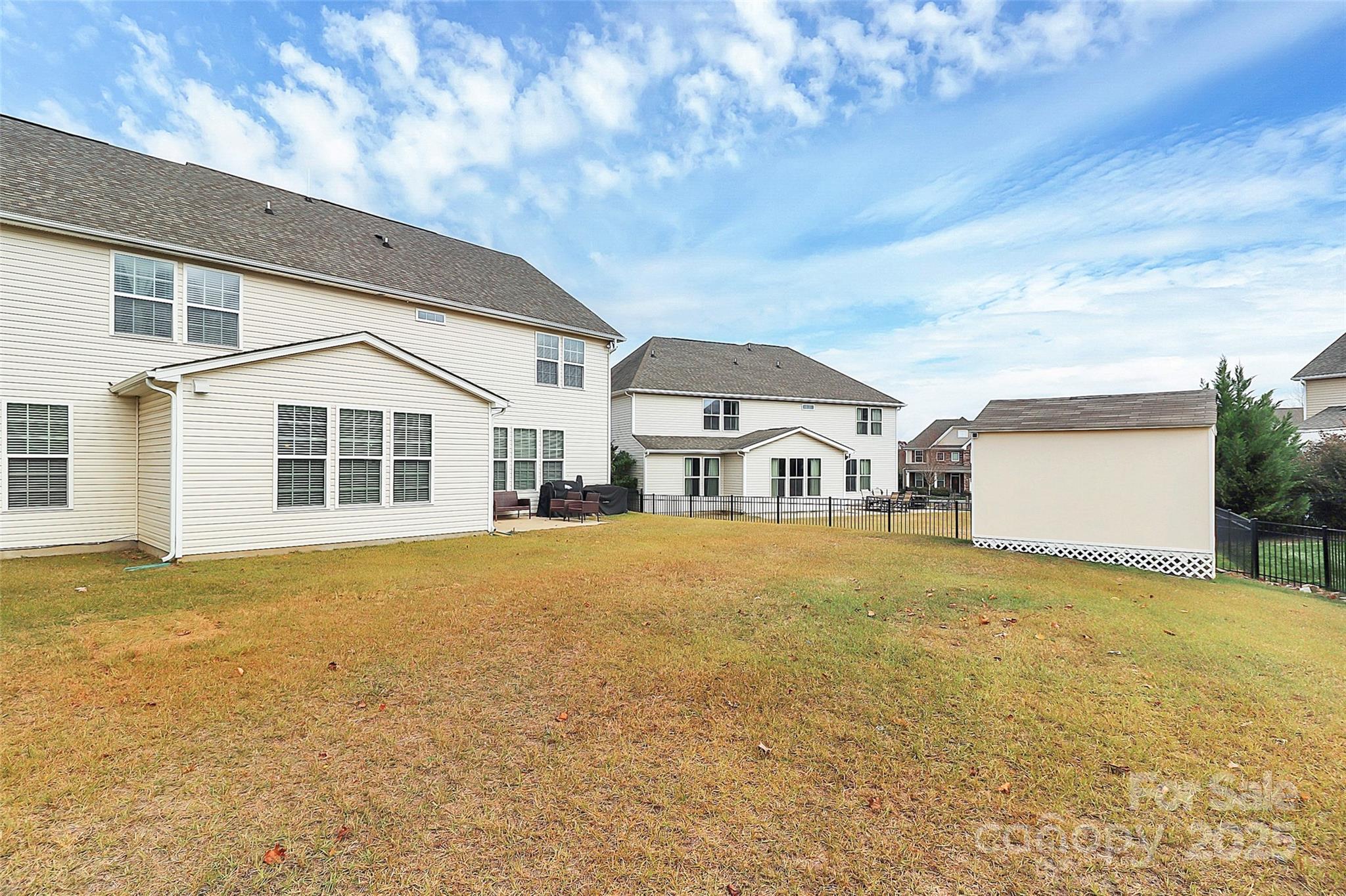 7362 Millstone Circle Southwest Concord, NC 28025 - Photo 40 of 45 a front view of a house with a large trees