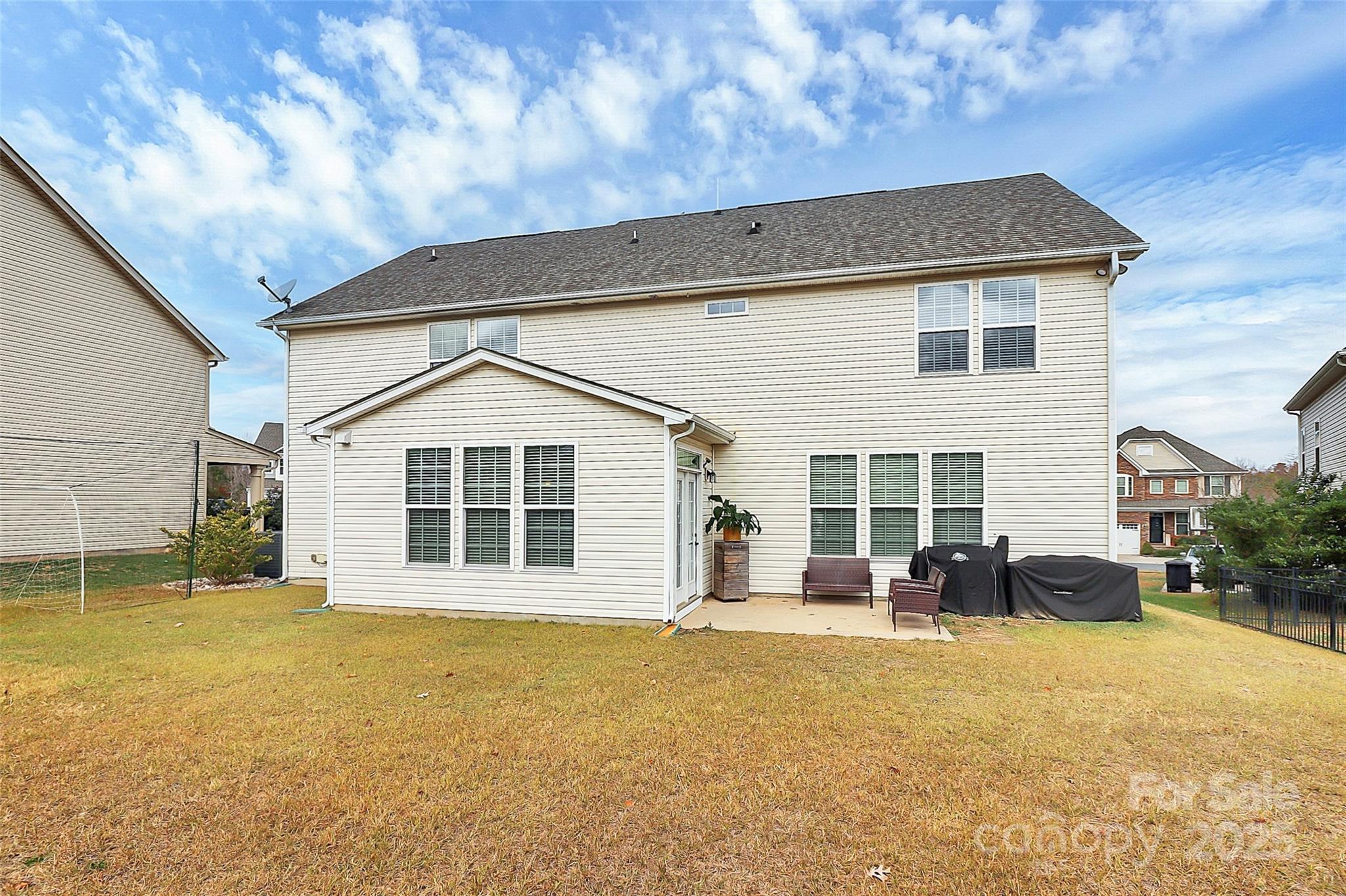 7362 Millstone Circle Southwest Concord, NC 28025 - Photo 42 of 45 a front view of a house with a yard