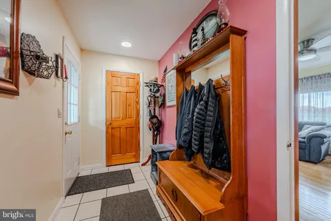 a bathroom with a bathtub a shower and a sink