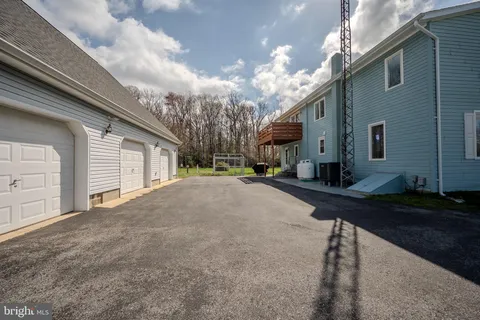 a view of a swimming pool with a lake view