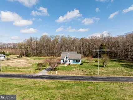 a view of a swimming pool with an ocean view