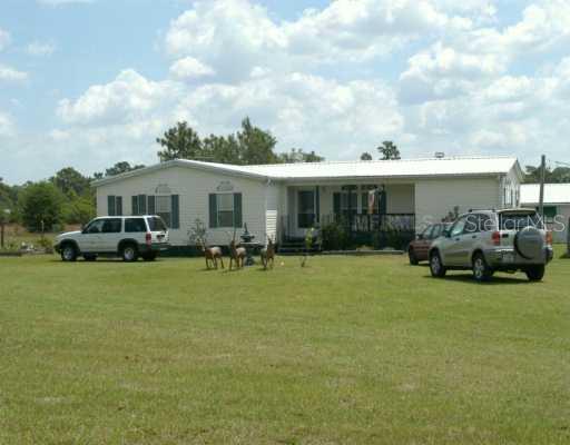 16634 Carlton Lake Road Wimauma, FL 33598 - Photo 1 of 1 Exterior Front