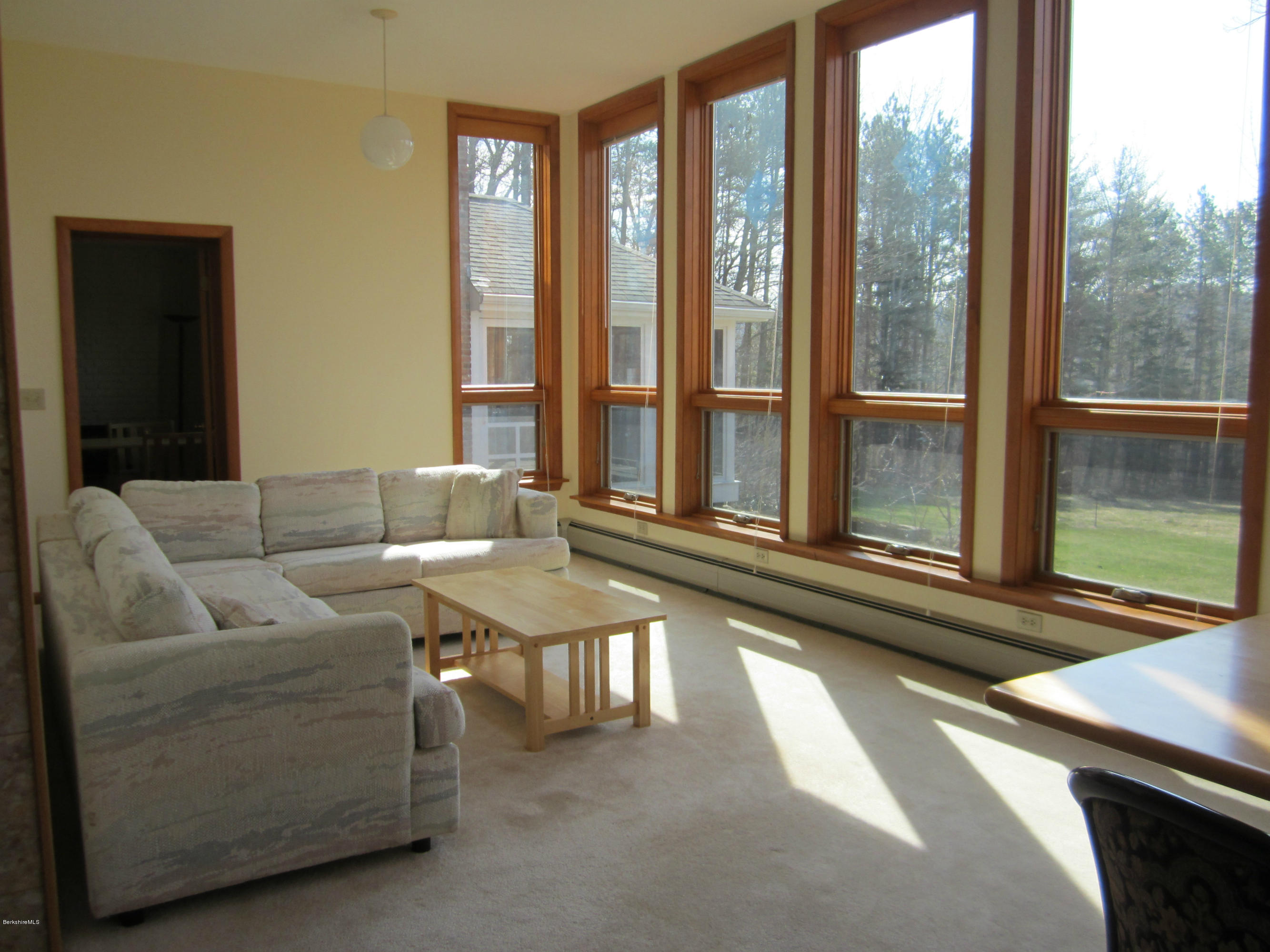 190 Main Road Monterey, MA 01230 - Photo 3 of 22 a living room with furniture and a floor to ceiling window