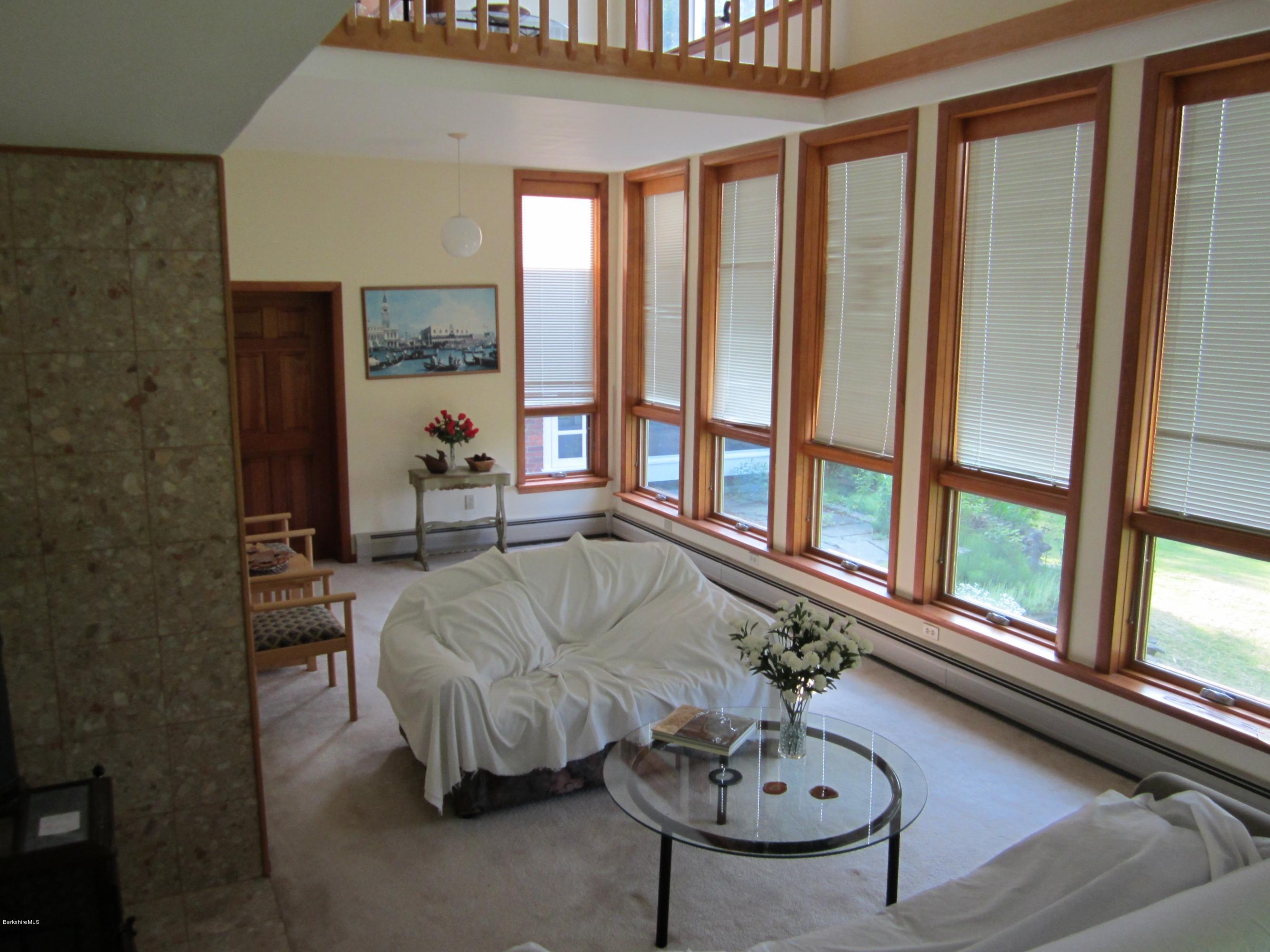 190 Main Road Monterey, MA 01230 - Photo 8 of 22 a living room with furniture and a large window