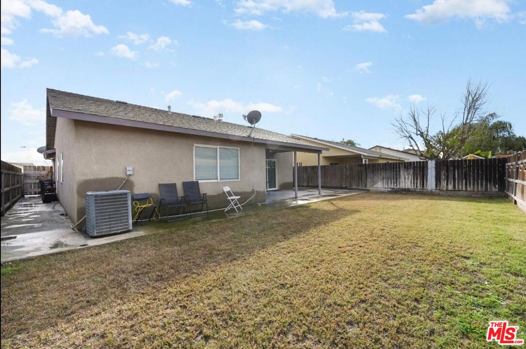 5612 McKee Road Bakersfield, CA 93313 - Photo 20 of 22 a backyard of a house with table and chairs