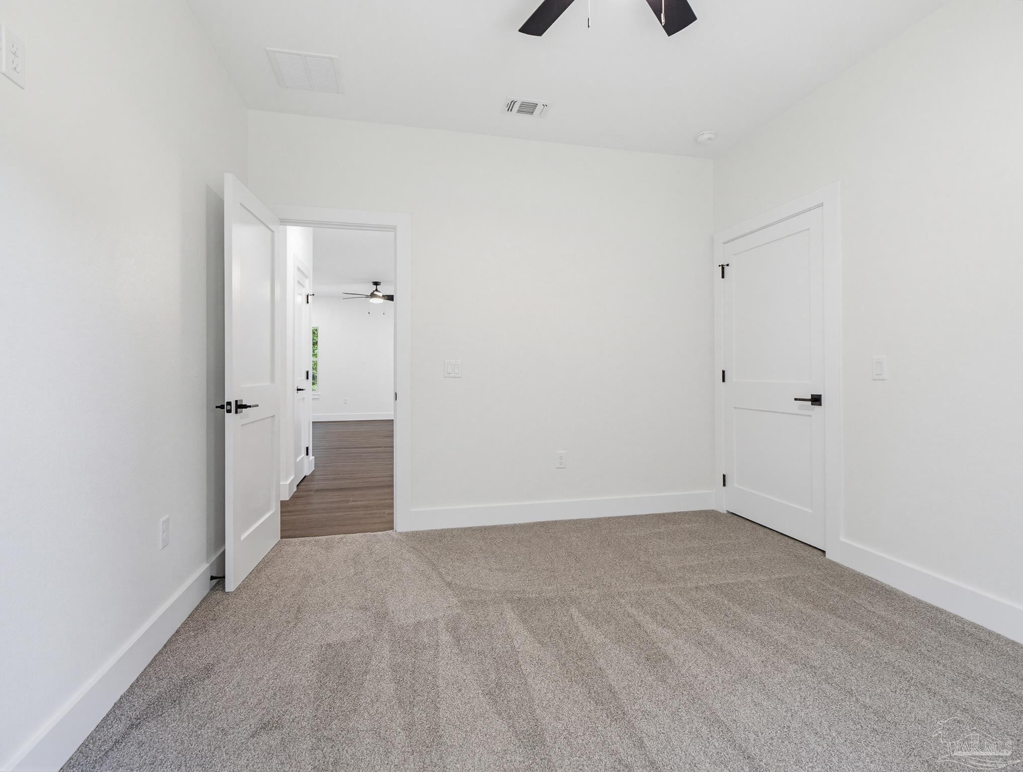 5724 Riviera Drive Milton, FL 32583 - Photo 43 of 52 wooden floor in a room
