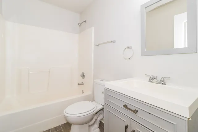 a view of a room that has a window in it